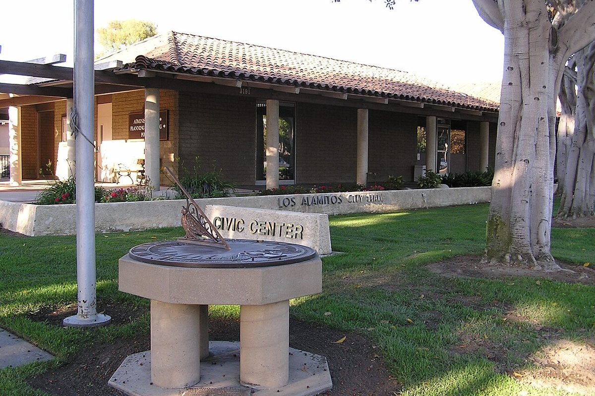 Los Alamitos City Hall with a sundial on the lawn in Los Alamitos, California